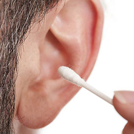Cleaning Ears with Cotton Swabs